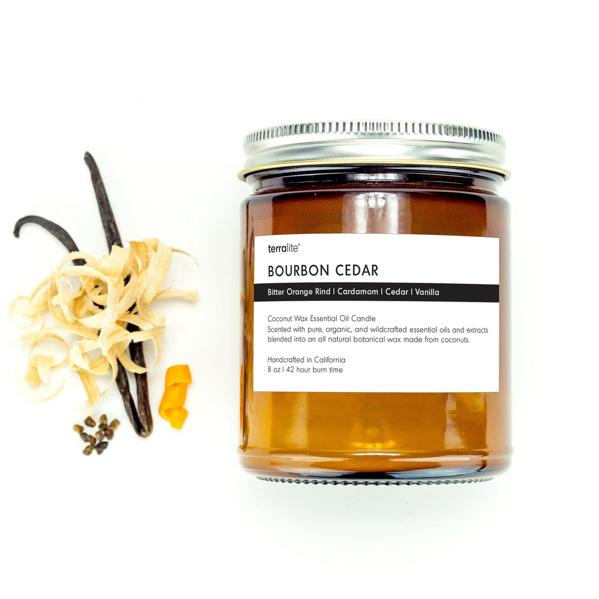 Bourbon Cedar essential oil candle scented with bitter orange, cedar, cardamom, and vanilla essential oils and plant extracts.